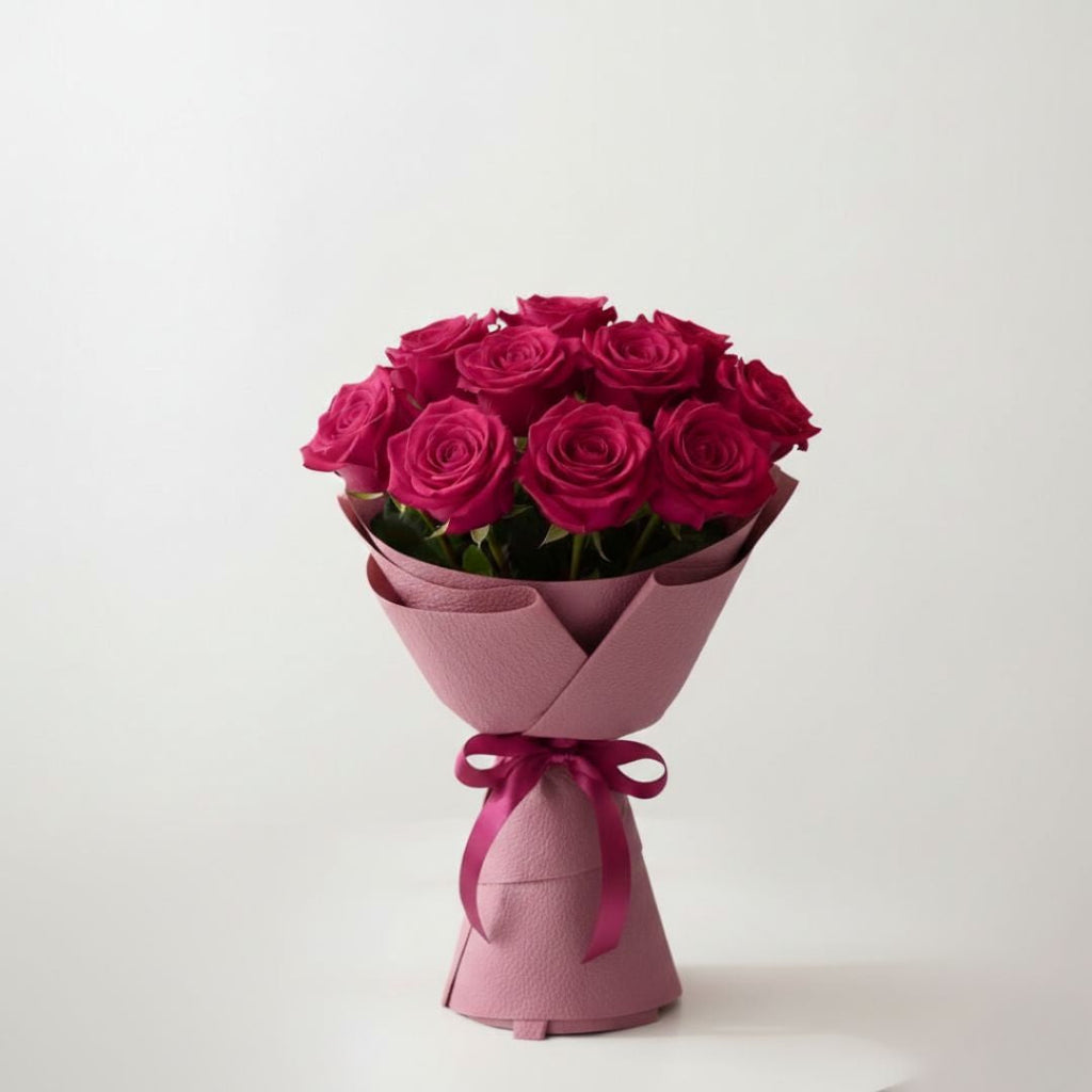 Rosy Gratitude with 11 Pink Roses by Black Petals Flowers